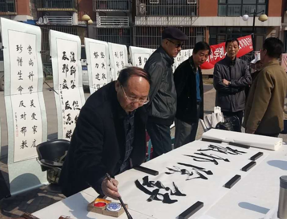 天津市滨海新区北塘街举办反邪教书法展